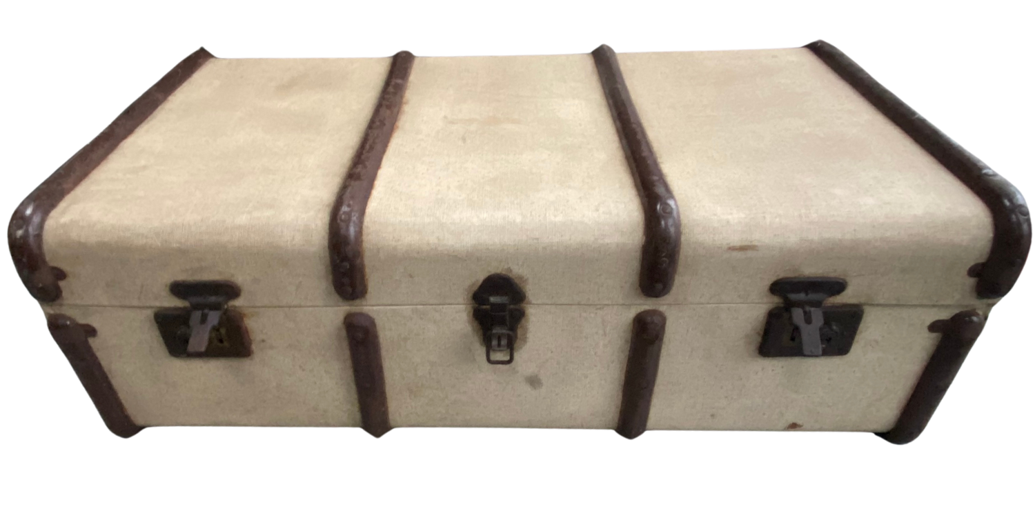 Cream and Brown steamer trunk with metal bands before its transformation